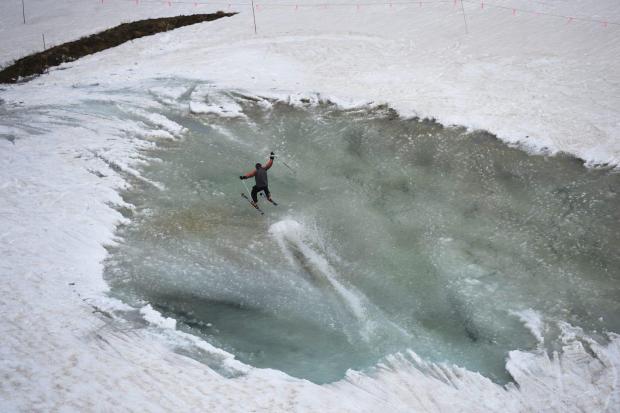 Arapahoe Basin's famous pond-skimming season arrives this weekend. A-Basin officials expect to be open through Sunday, and possibly the following weekend as well. (Andy Cross/Denver Post file)